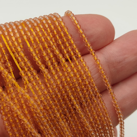 Шпинель 2мм Topaz (на нити 185-190 бусин) Шпинель 2мм Topaz (на нити 185-190 бусин)